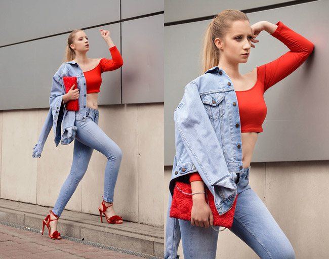 Девушка в красных босоножках, топе и джинсах скинни